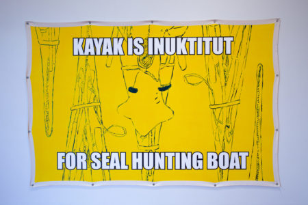 Mark Igloliorte. Kayak is Inuktitut for Seal Hunting Boat, 2019. Vinyl reproduction of acrylic on unstretched canvas. Collection of the artist.
