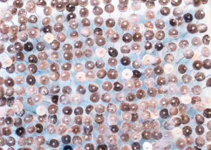 Maureen Gruben. Breathing Hole (detail), 2019. Dricore insulation board, stainless steel pins, sealskin, white cotton thread, 48x30.