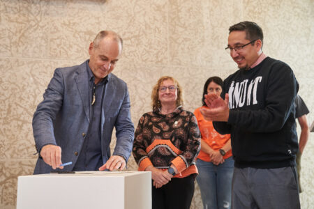 Stephen Borys, WAG-Qaumajuq Director & CEO, signing MOU, Photo: David Lipnowski