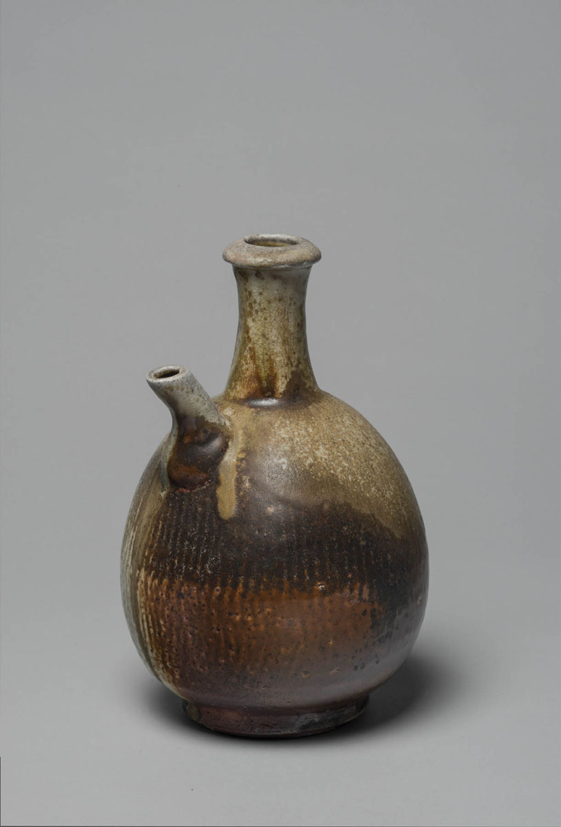 Spouted pouring vessel